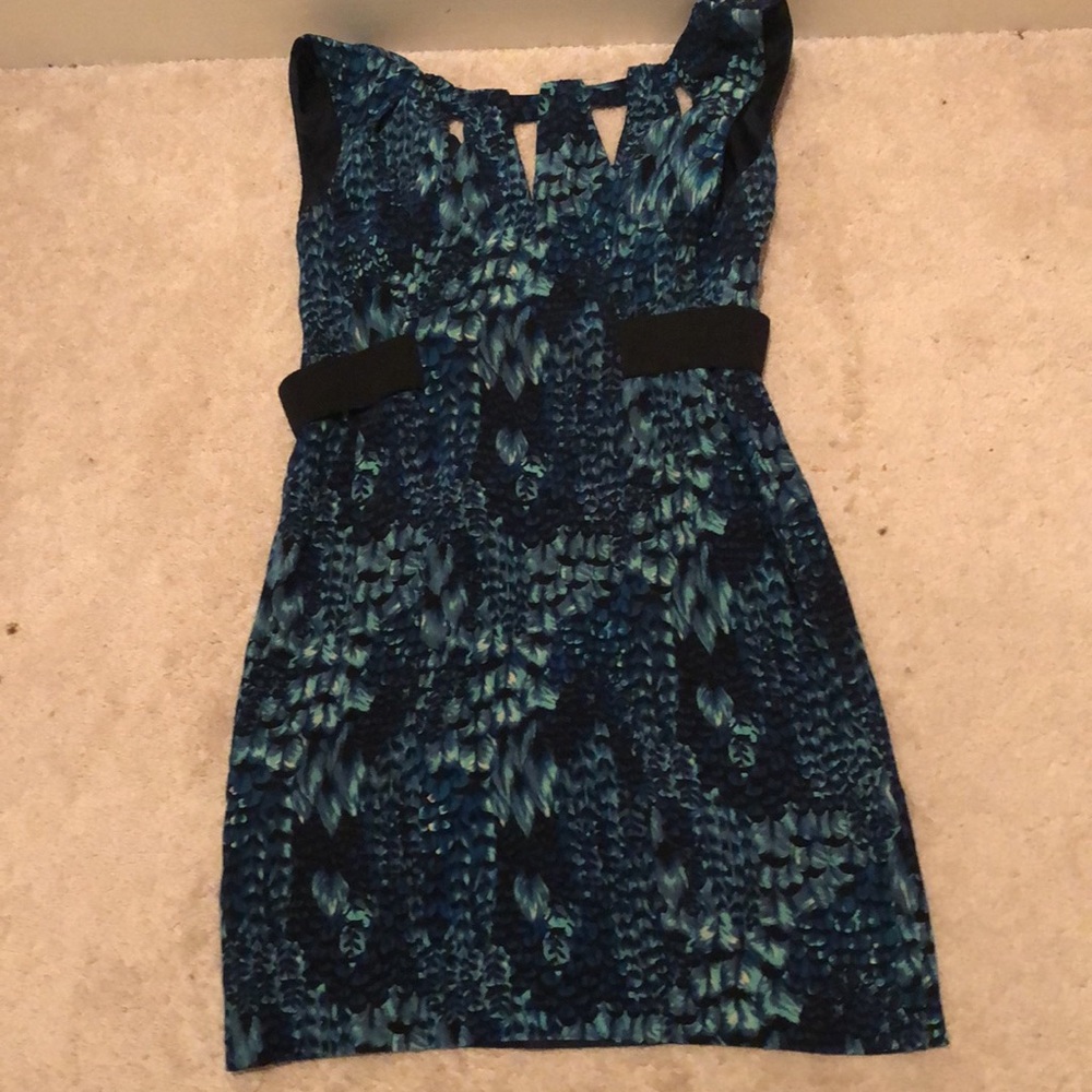 Nanette Lepore shift dress. Cut-outs on top and black elastic side ribbons.